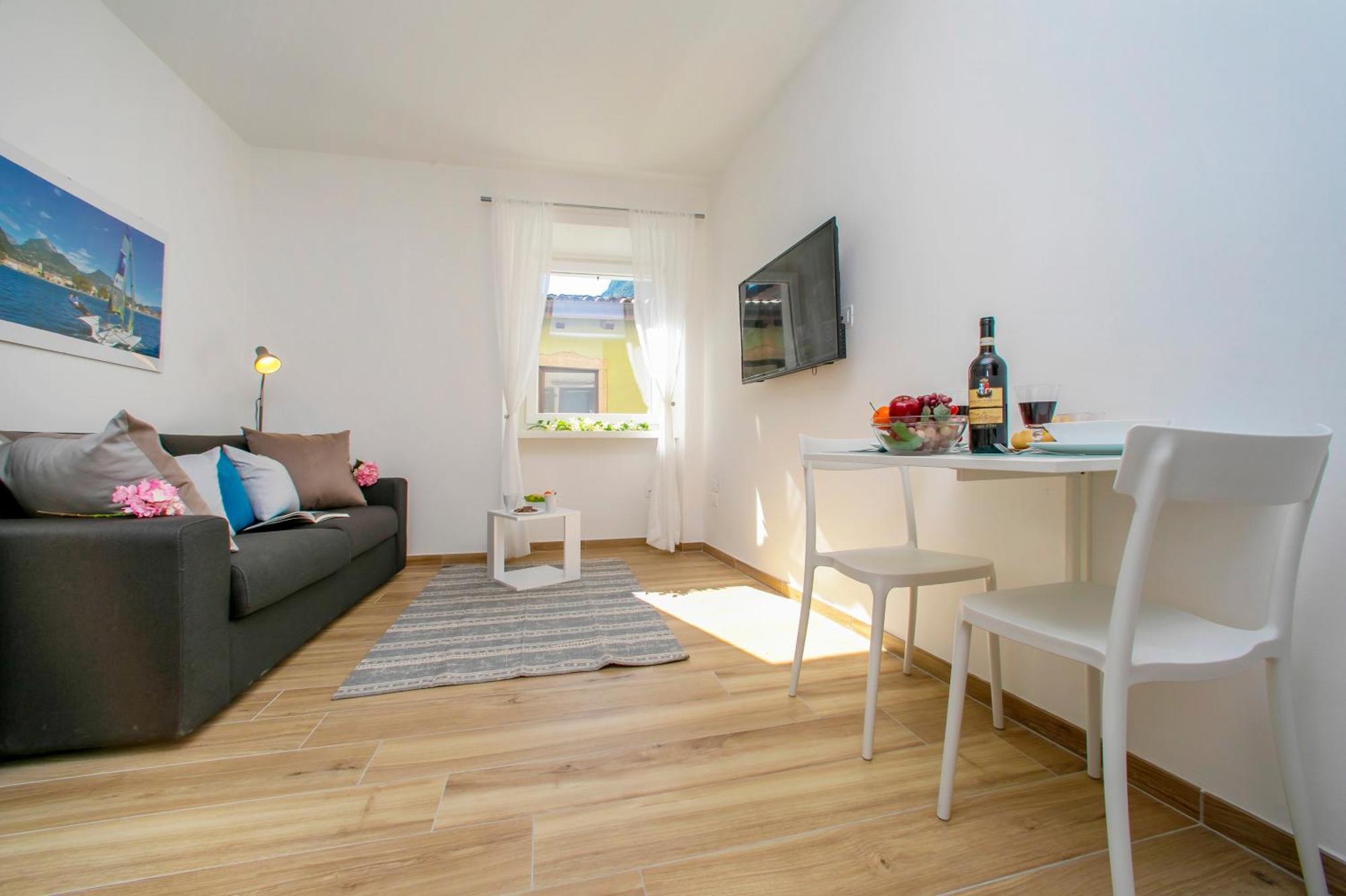 Nido Sui Tetti Di Riva Del Garda - Happy Rentals المظهر الخارجي الصورة