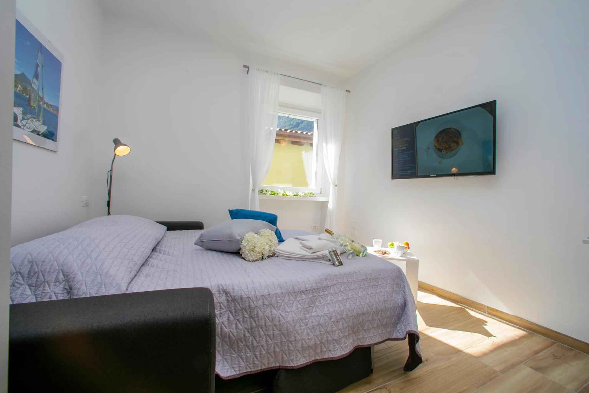Nido Sui Tetti Di Riva Del Garda - Happy Rentals المظهر الخارجي الصورة