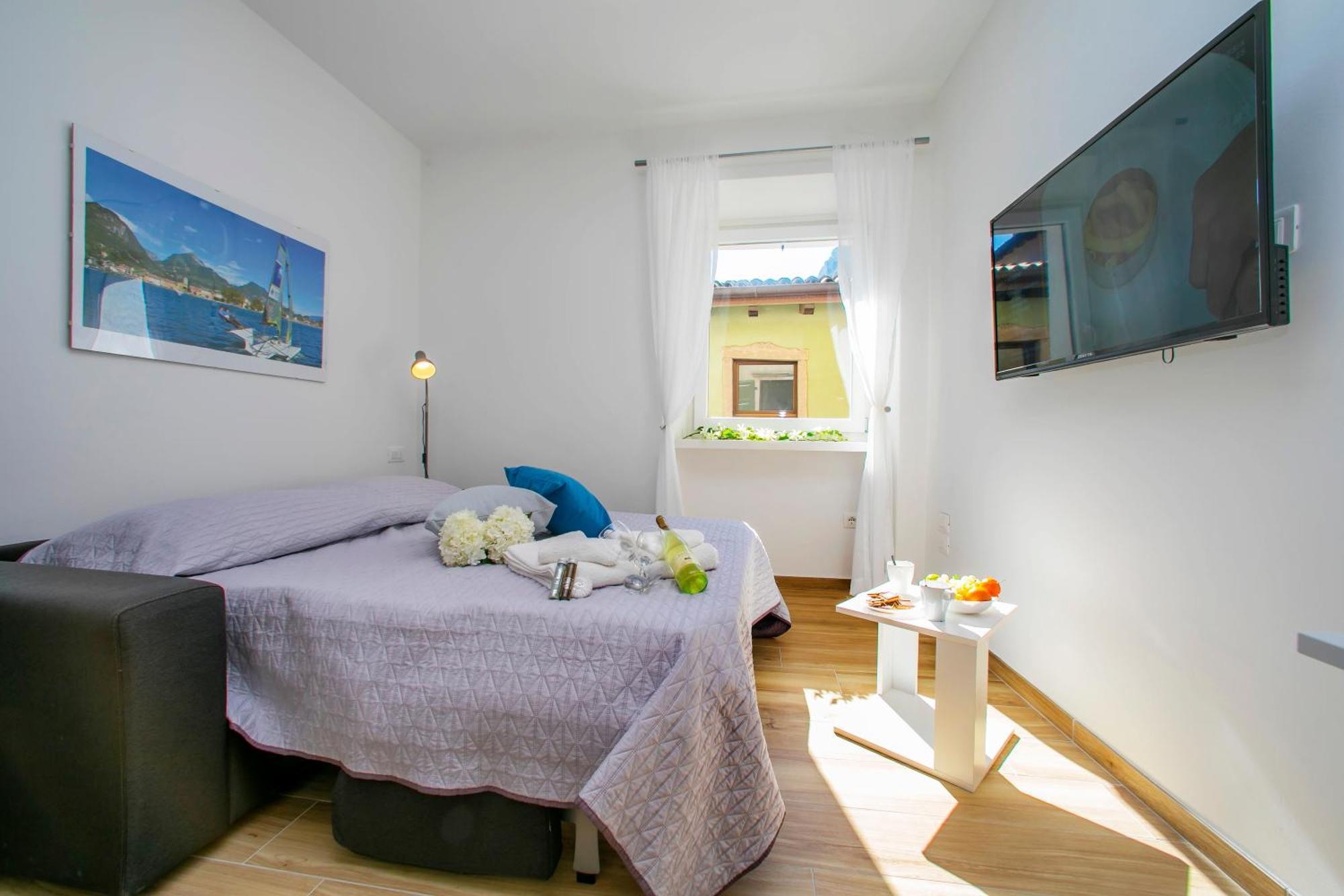 Nido Sui Tetti Di Riva Del Garda - Happy Rentals المظهر الخارجي الصورة